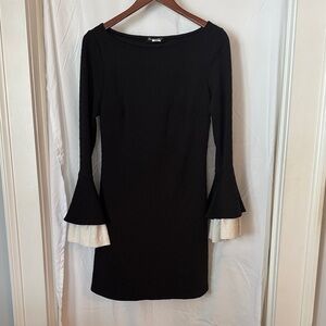 Elegant Black Dress with White Flared Sleeves